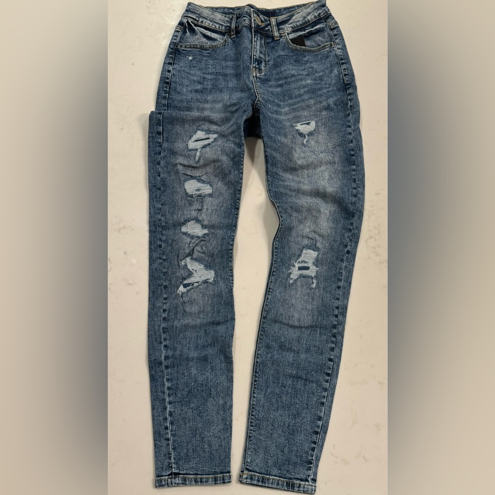 Distressed Blue Denim Jeans